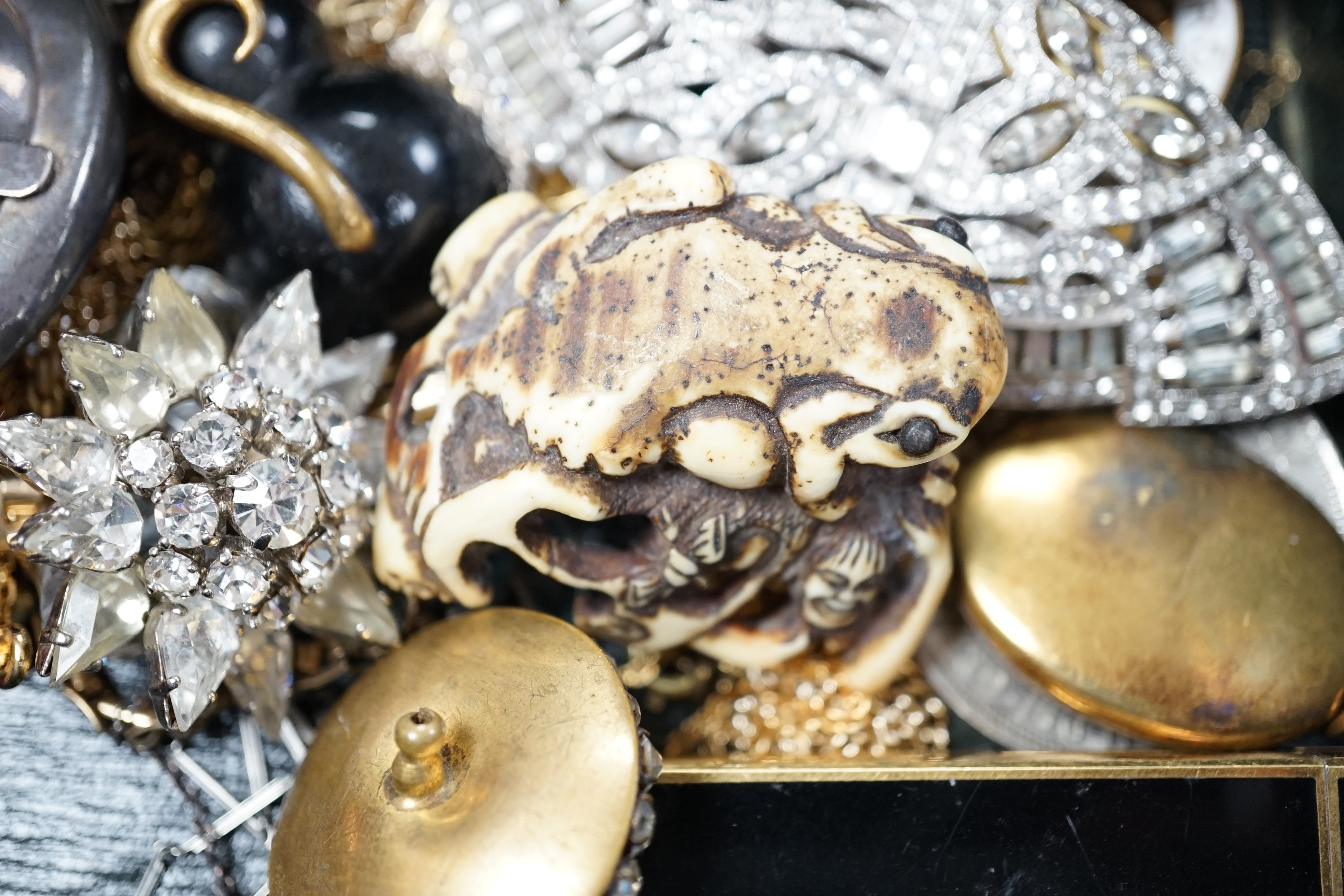 Mixed mainly costume jewellery including paste set necklace, pendant necklaces, silver lockets, lighters etc.